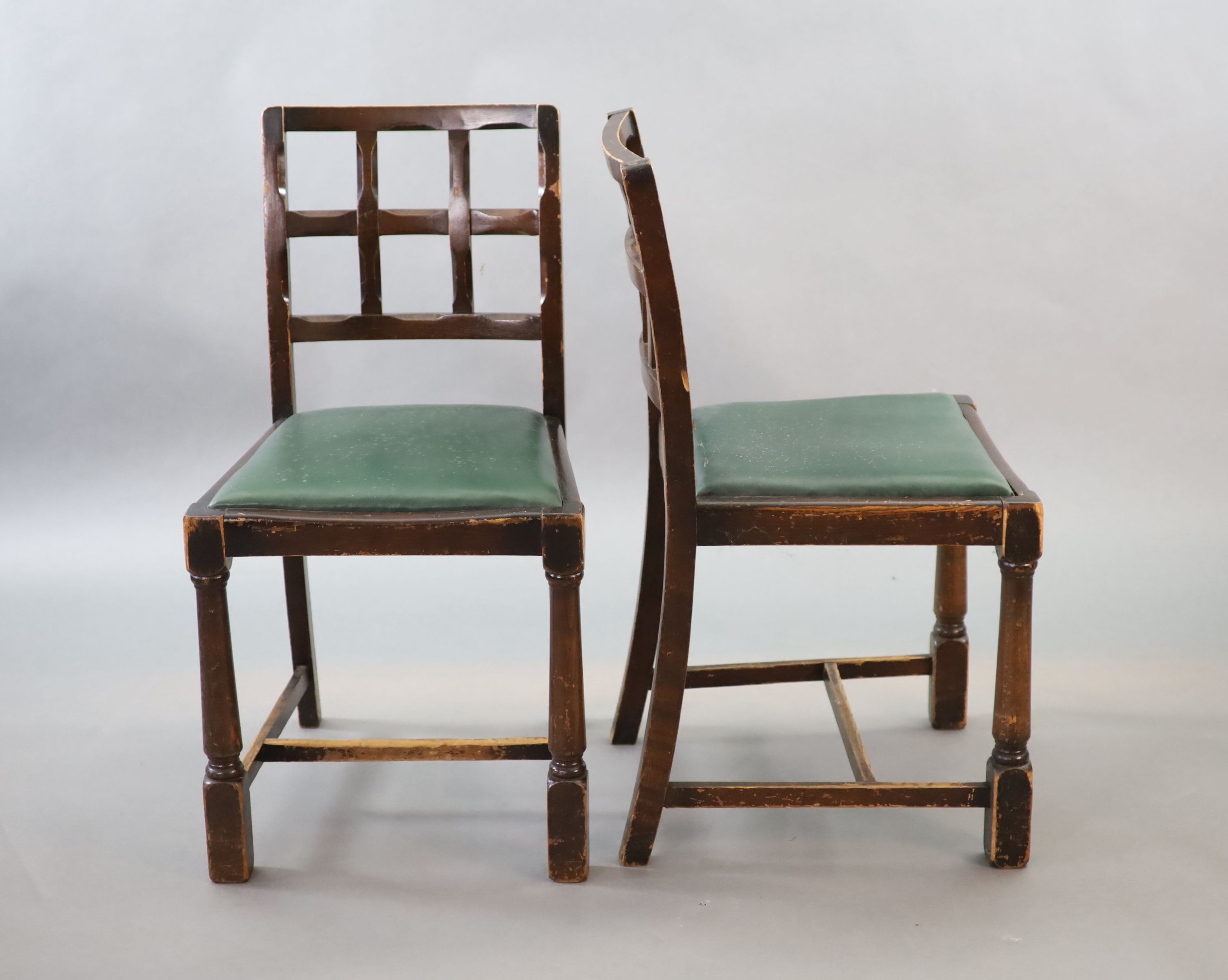 A set of ten early 20th century oak and beech dining chairs